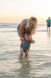 baby walking in the water
