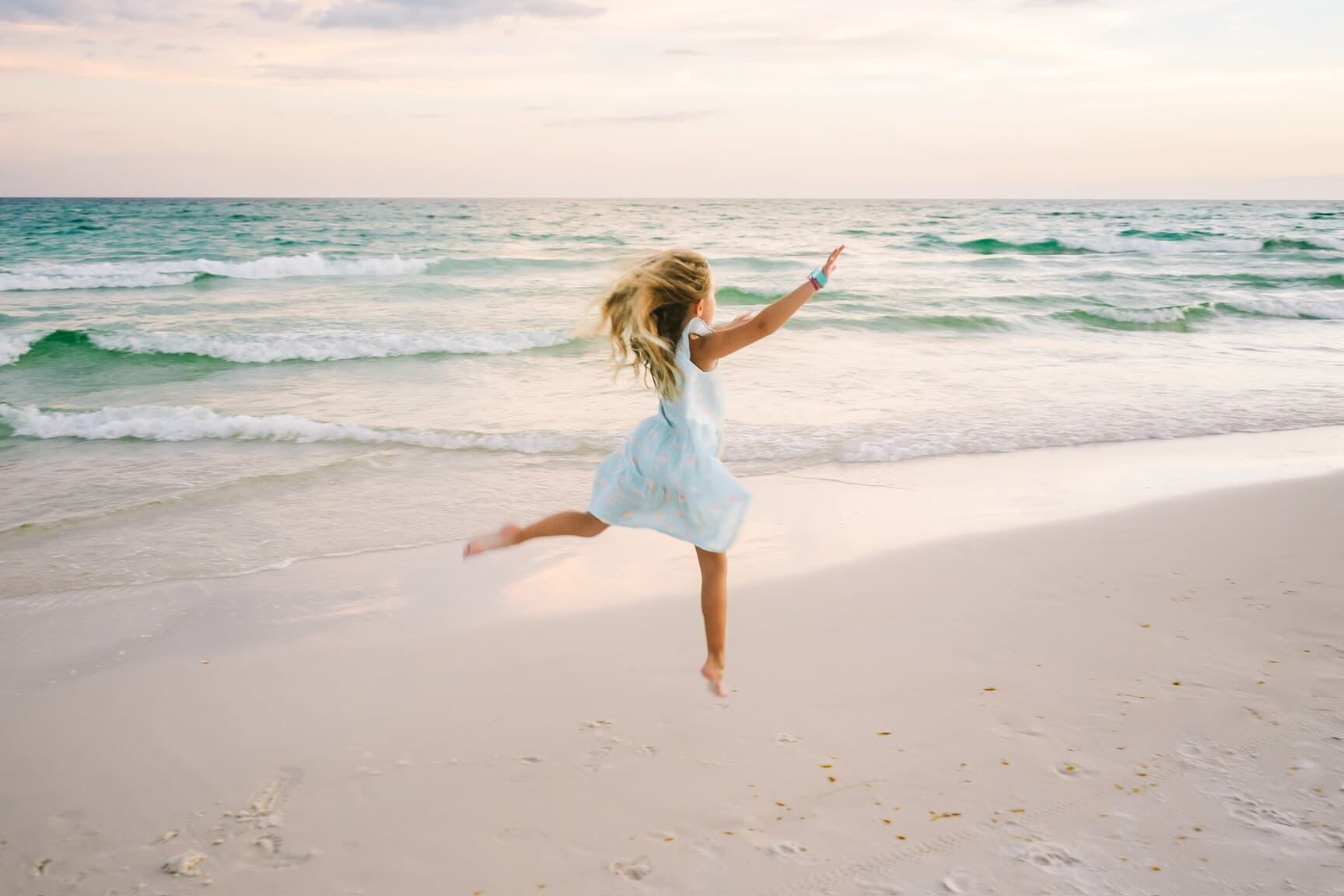 Young girl enjoying the beach